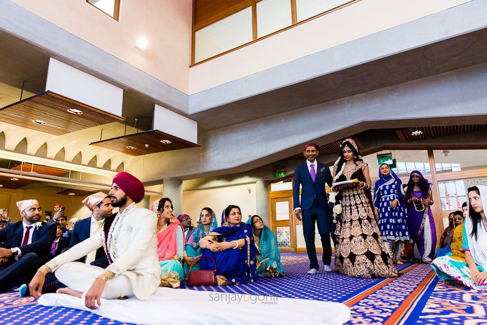 Bridal entrance during Sikh wedding ceremony