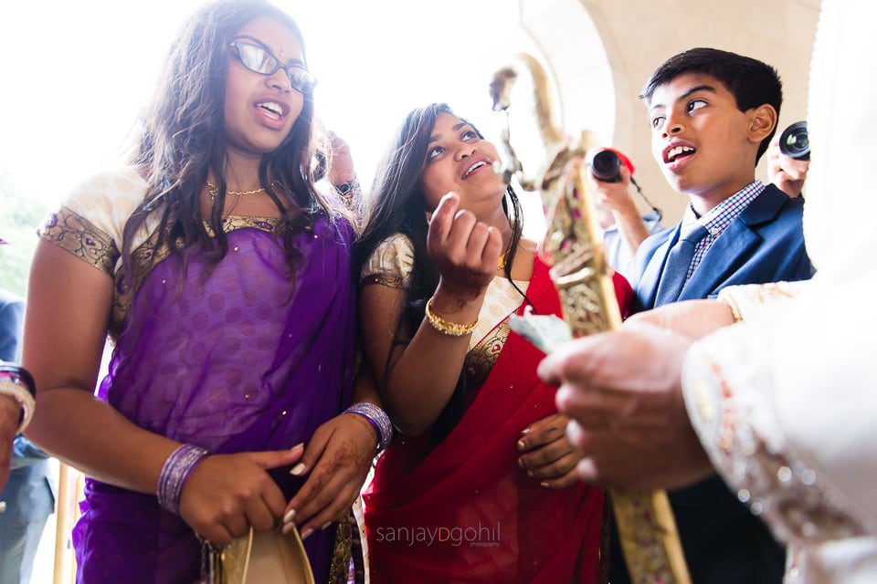 Bride's sisters bargaining for shoes