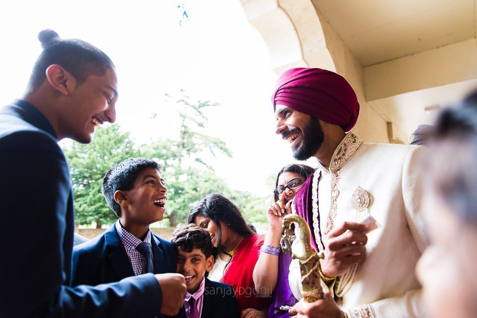 Bride's brothers bargaining for shoes