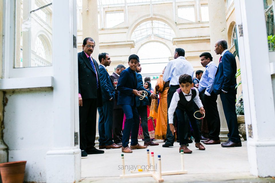 Asian Wedding guests playing games