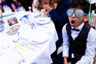 Wedding guest with funny glasses on