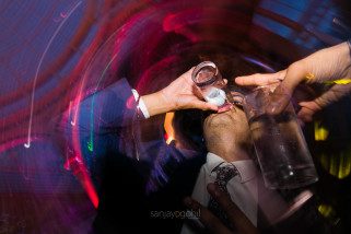 Asian Wedding guests dancing during reception party at Syon Conservatory