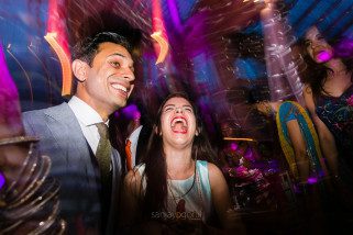 Asian Wedding guests dancing during reception party at Syon Conservatory