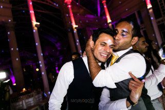 Asian Wedding guests dancing during reception party at Syon Conservatory