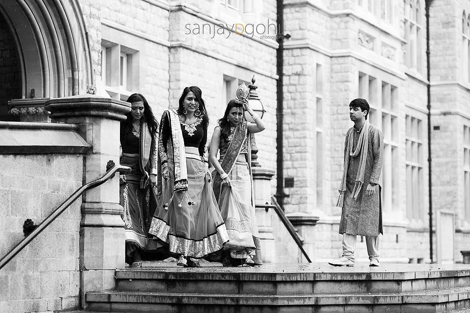 Sisters of Hindu Bride greeting groom