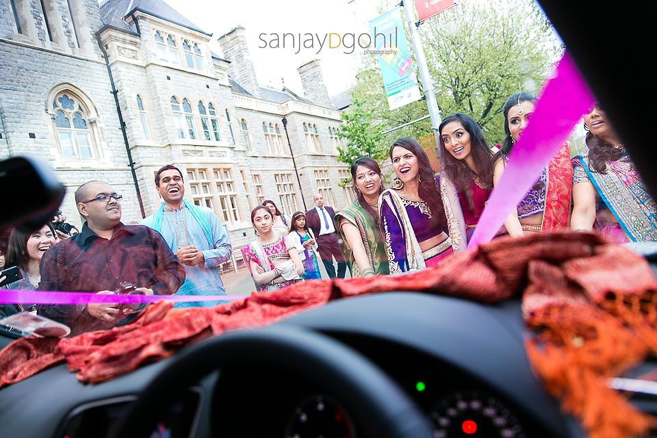 Sister's infront of the car