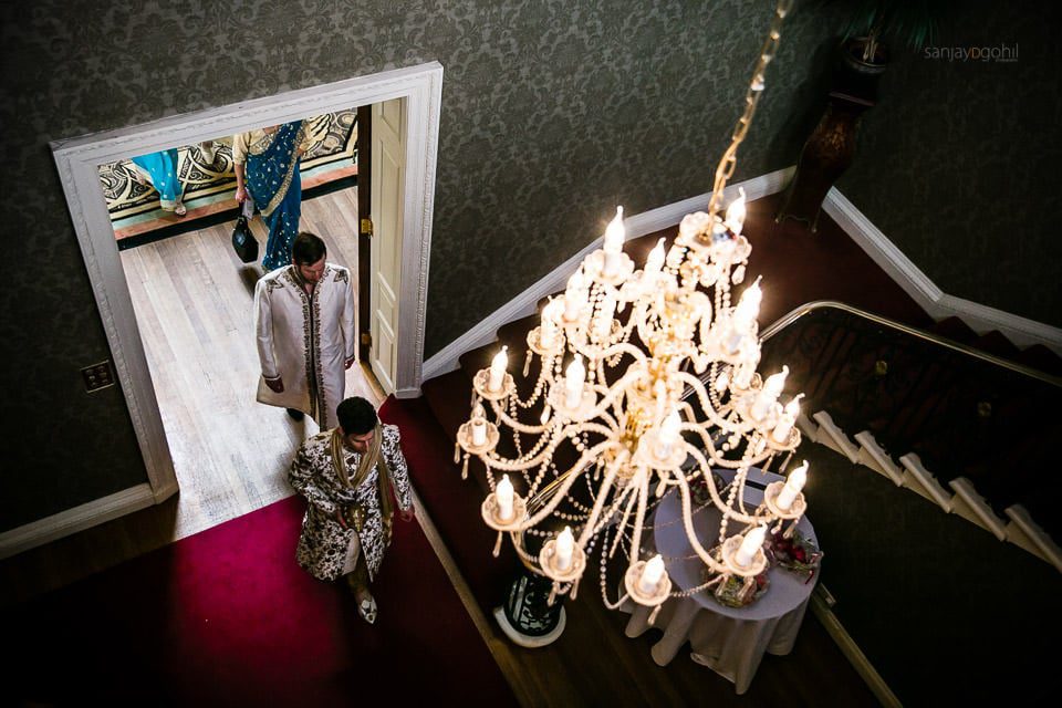 Asian Wedding Groom walking to Mandap