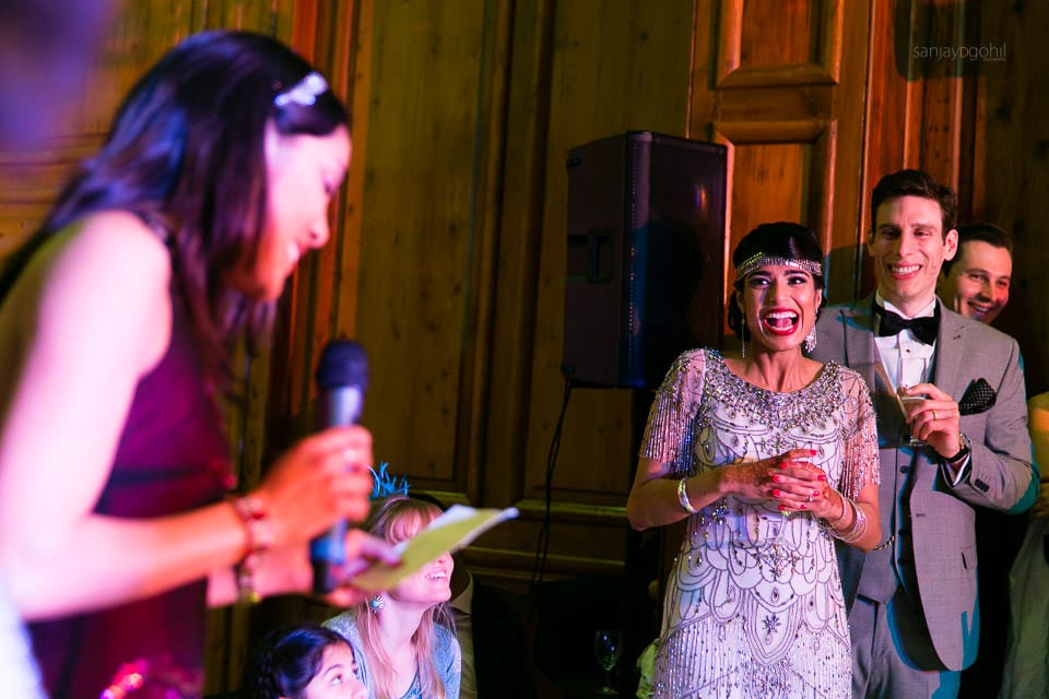 Asian Bride laughing during speech