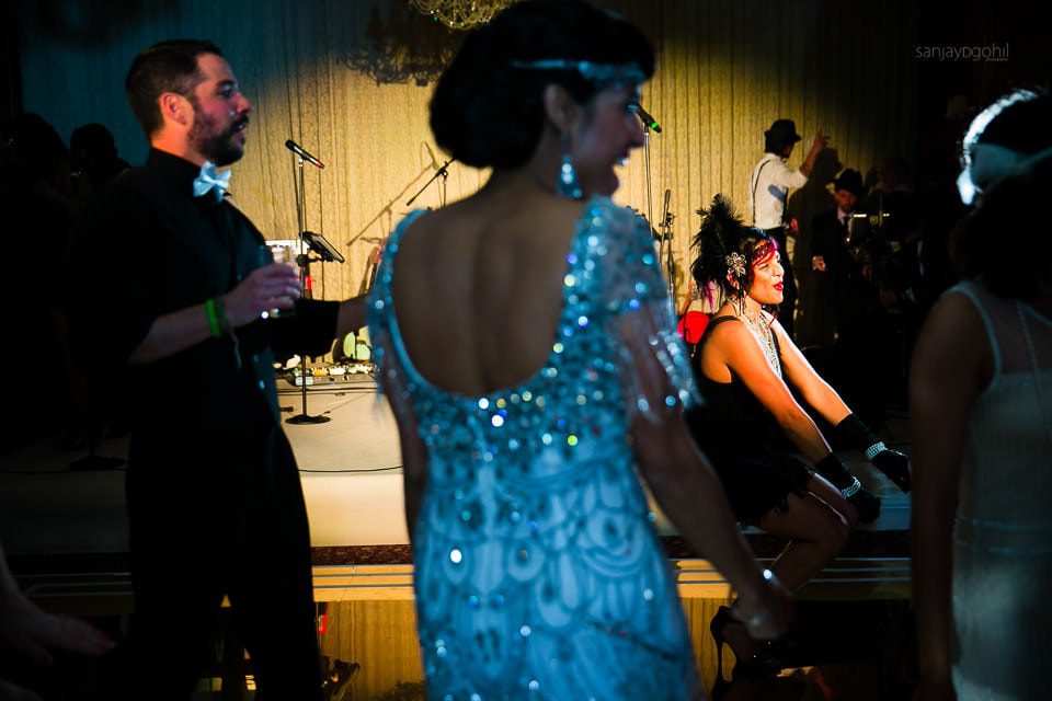 Wedding guests dancing during reception party at Hedsor House