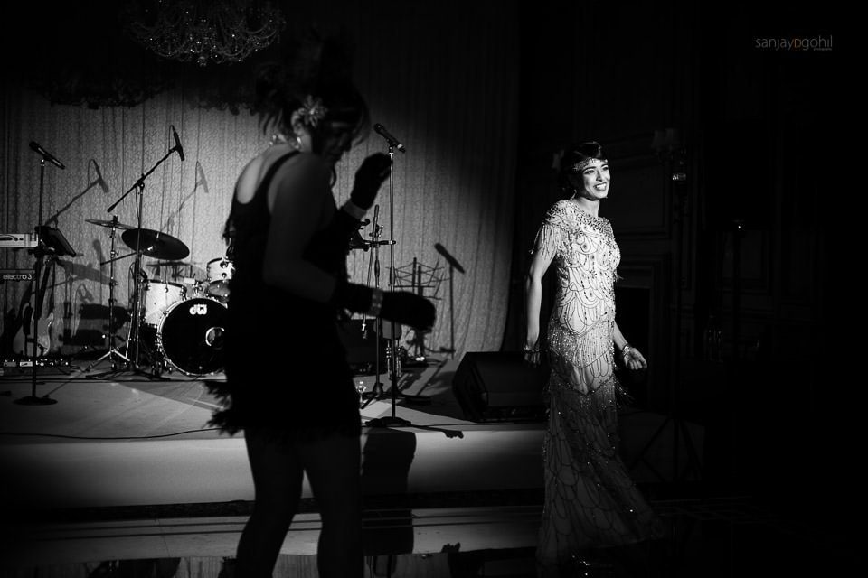 Wedding guests dancing during reception party at Hedsor House