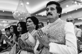Wedding guests praying