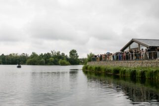 Bride and groom arriving by boat