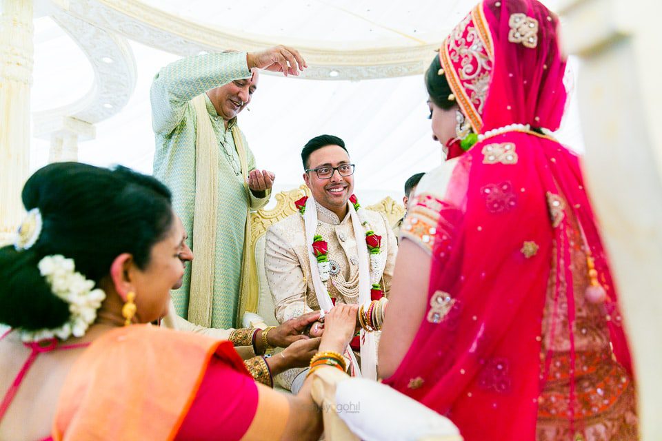 Hindu wedding ceremony being conducted by Vasudev Mehta