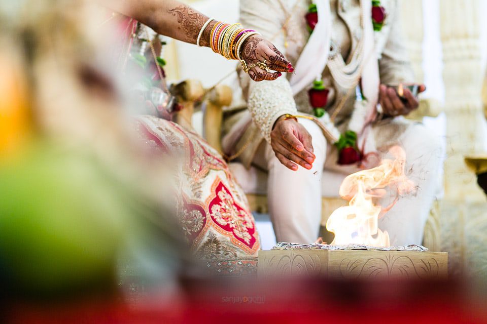 Seeds being thrown into the fire