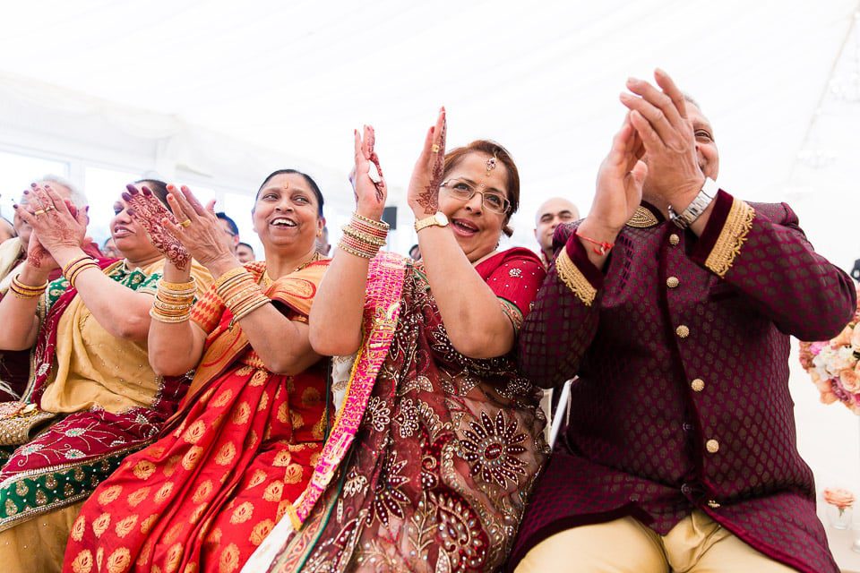 Hindu Wedding guests laughing