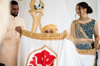 Gujarati wedding groom behind the veil