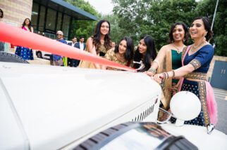 Sisters of the bride stopping the car