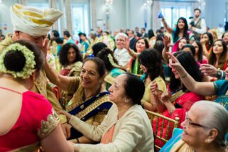 Parents getting blessings from family