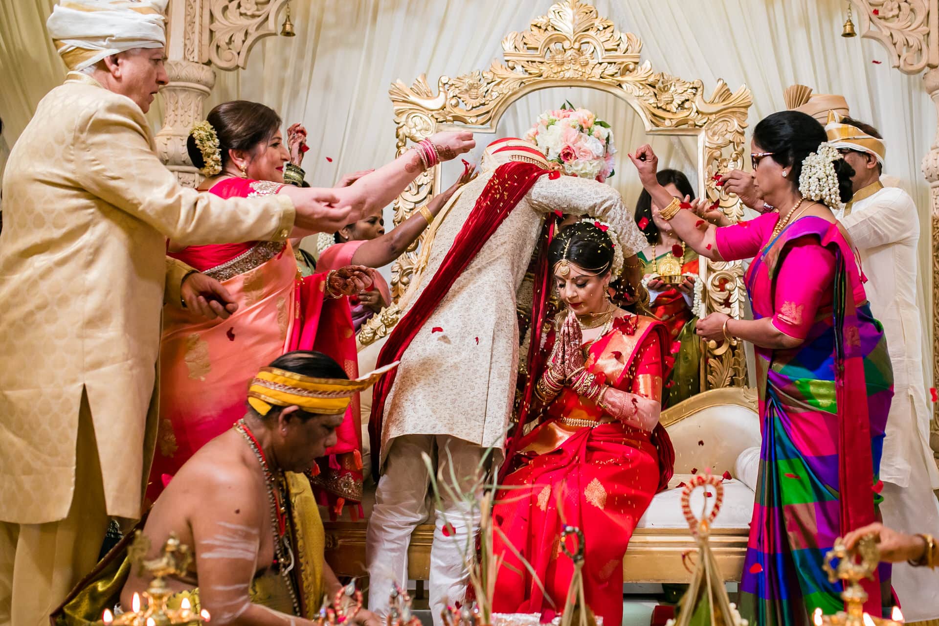 Family showering bride with petals