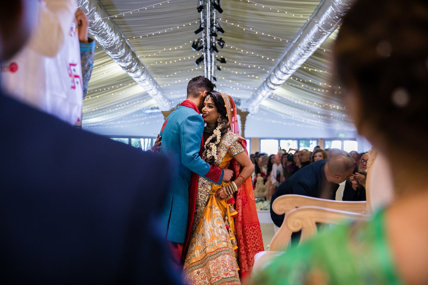 Bride hugging brother