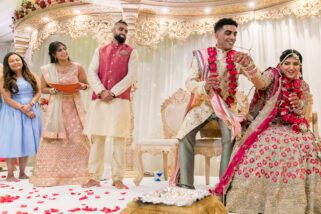 Bride sits down before the groom