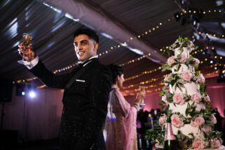 Groom toasting wedding guests